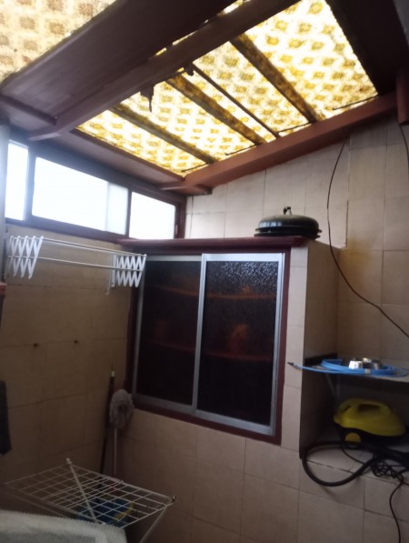 Patio con el lavadero